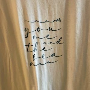 Sperry T-shirt with folded sleeves gently used.